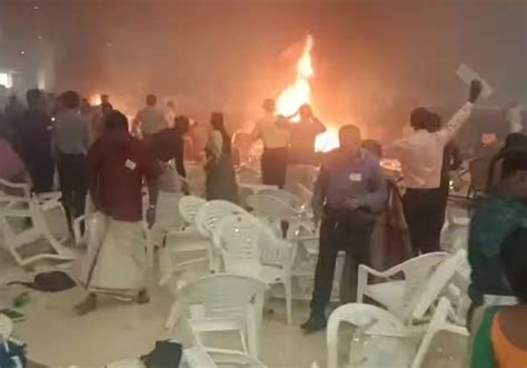 Explosive device blows up at convention center in south India killing at least one and wounding 36